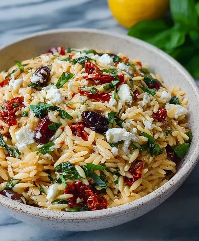 Homemade Orzo Pasta Salad with Feta and Sun Dried Tomatoes - FlirtyFood
